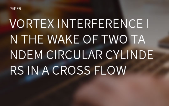 VORTEX INTERFERENCE IN THE WAKE OF TWO TANDEM CIRCULAR CYLINDERS IN A CROSS FLOW